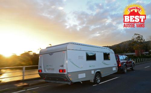A pop top caravan at sunset